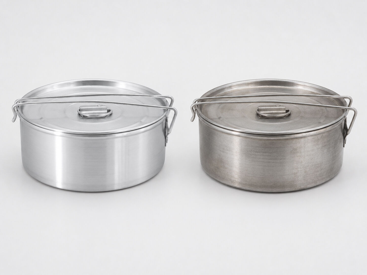 Side-by-side comparison of a new flan mold versus a well-used mold showing natural aluminum discoloration